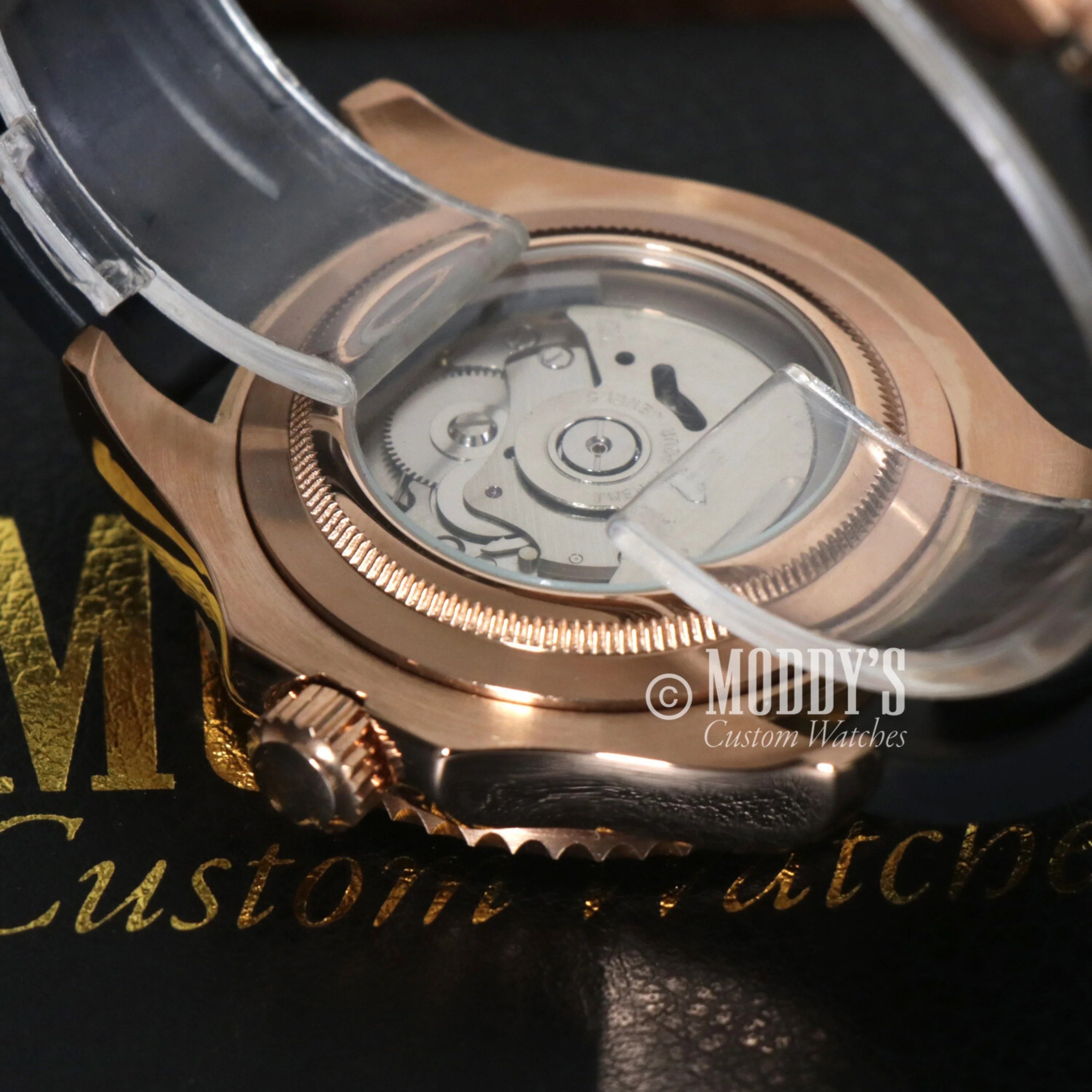 Rose Gold watch case with transparent back showcasing movement mechanism, Seikomarine Rose Gold Black