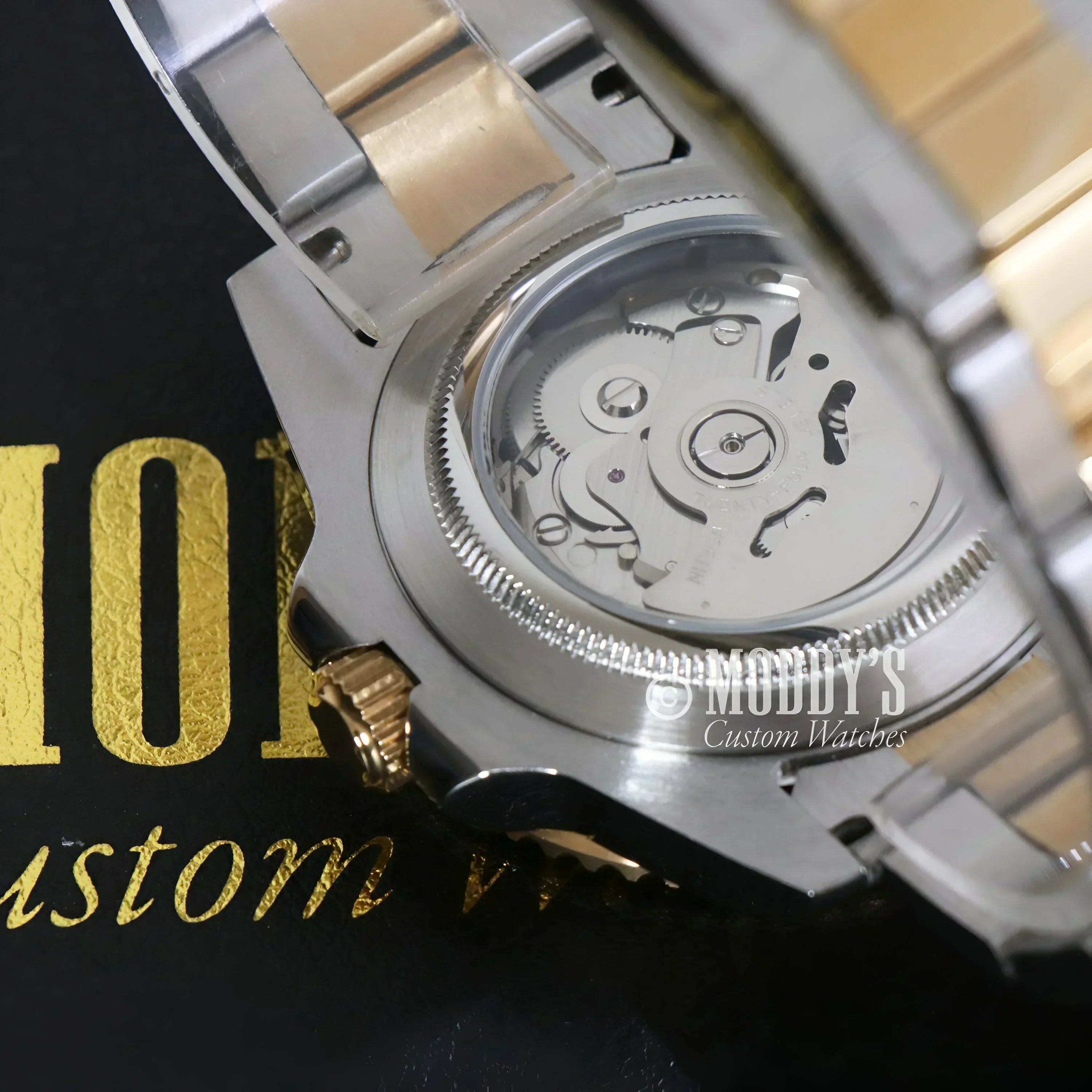 Exposed NH35 automatic movement of Seikomariner Black Two Tones watch design
