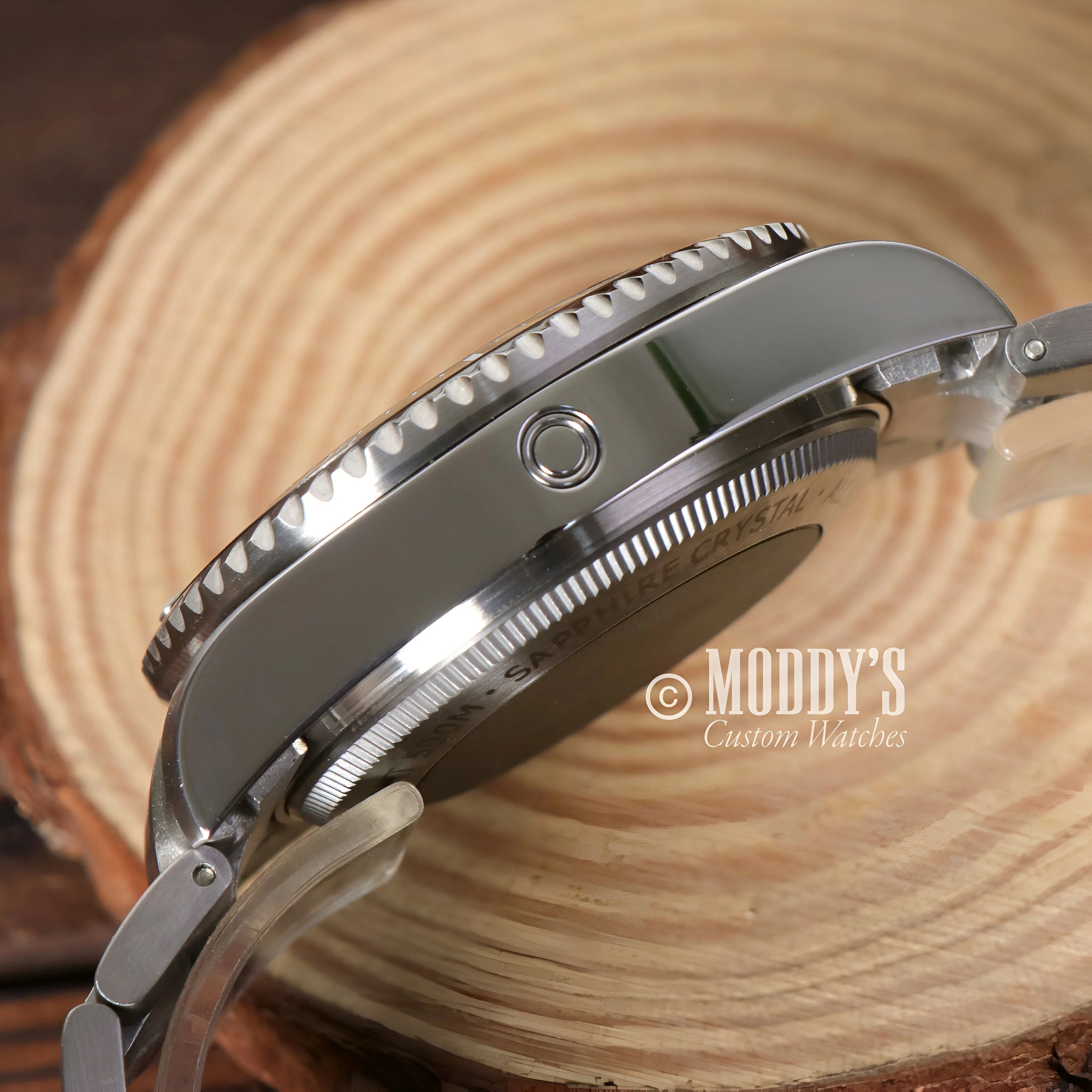 Side view of Seikomariner Deepsea watch case in 904L stainless steel with prominent bezel