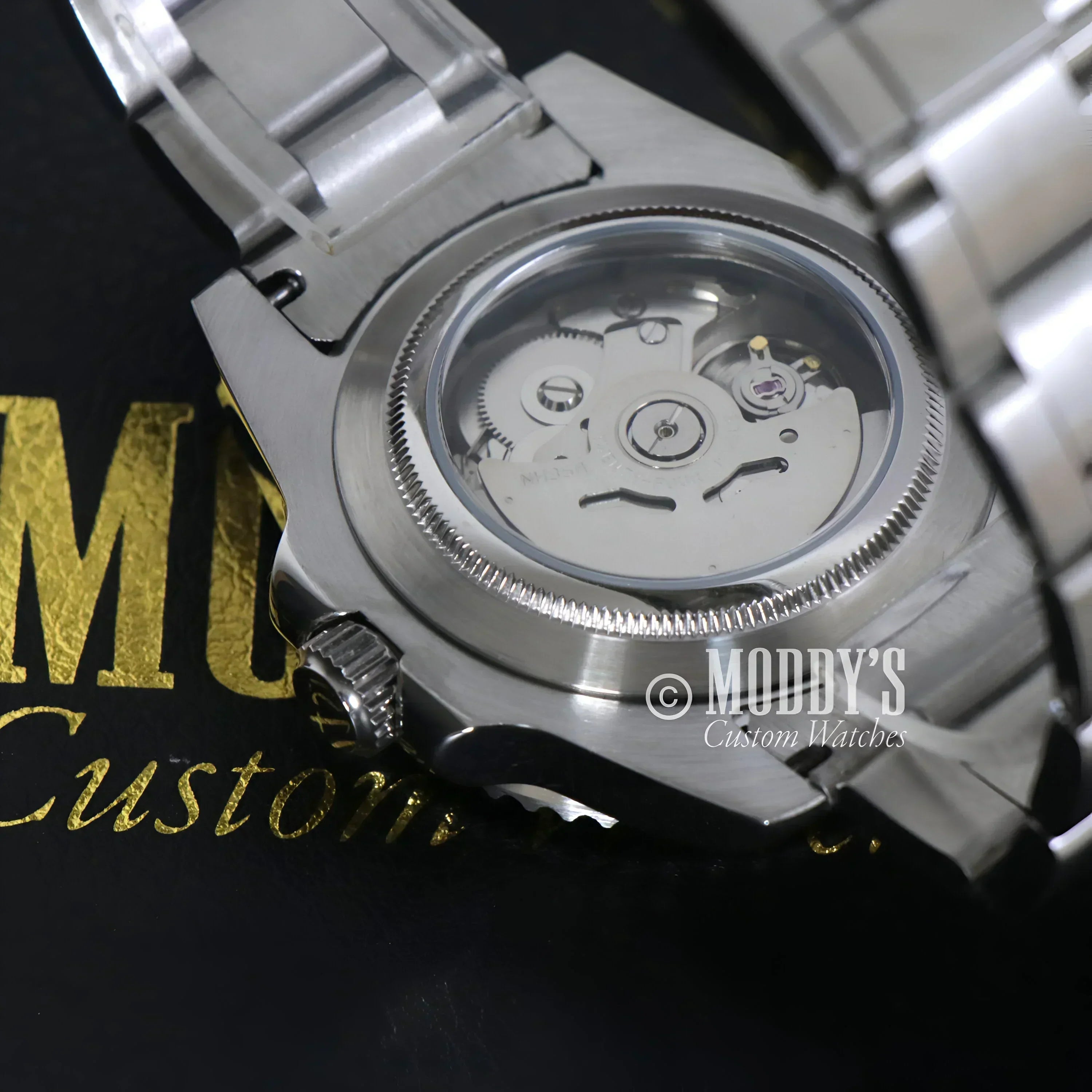 Silver Seikomariner Kermit wristwatch showcasing Seiko NH35 automatic movement