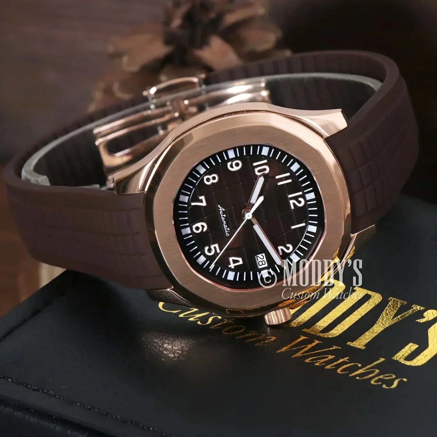 Rose gold Seiko Mod Aquanaut wristwatch with brown band and NH35 automatic movement