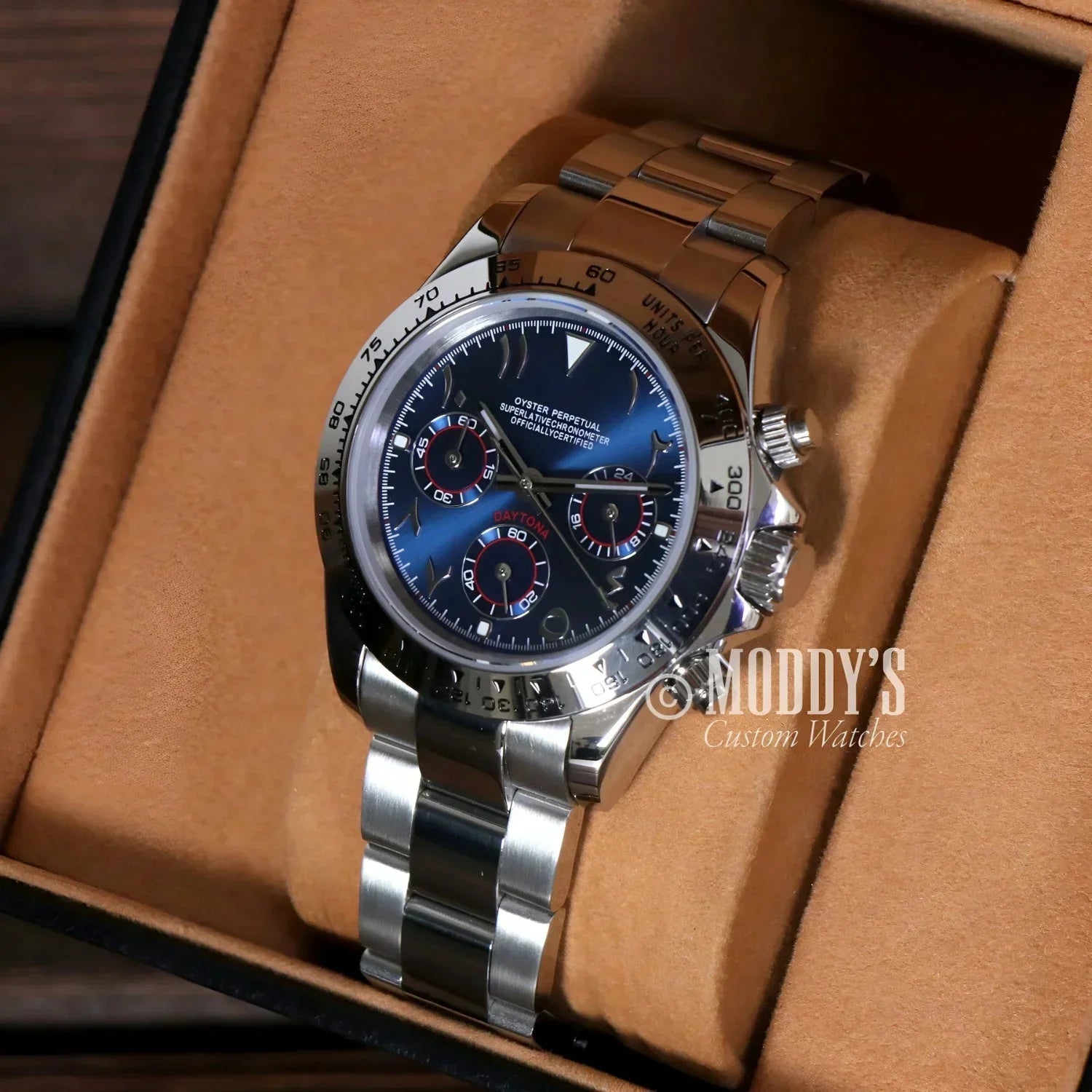 Silver wristwatch with blue face from Seitona featuring Seiko VK63 hybrid movement