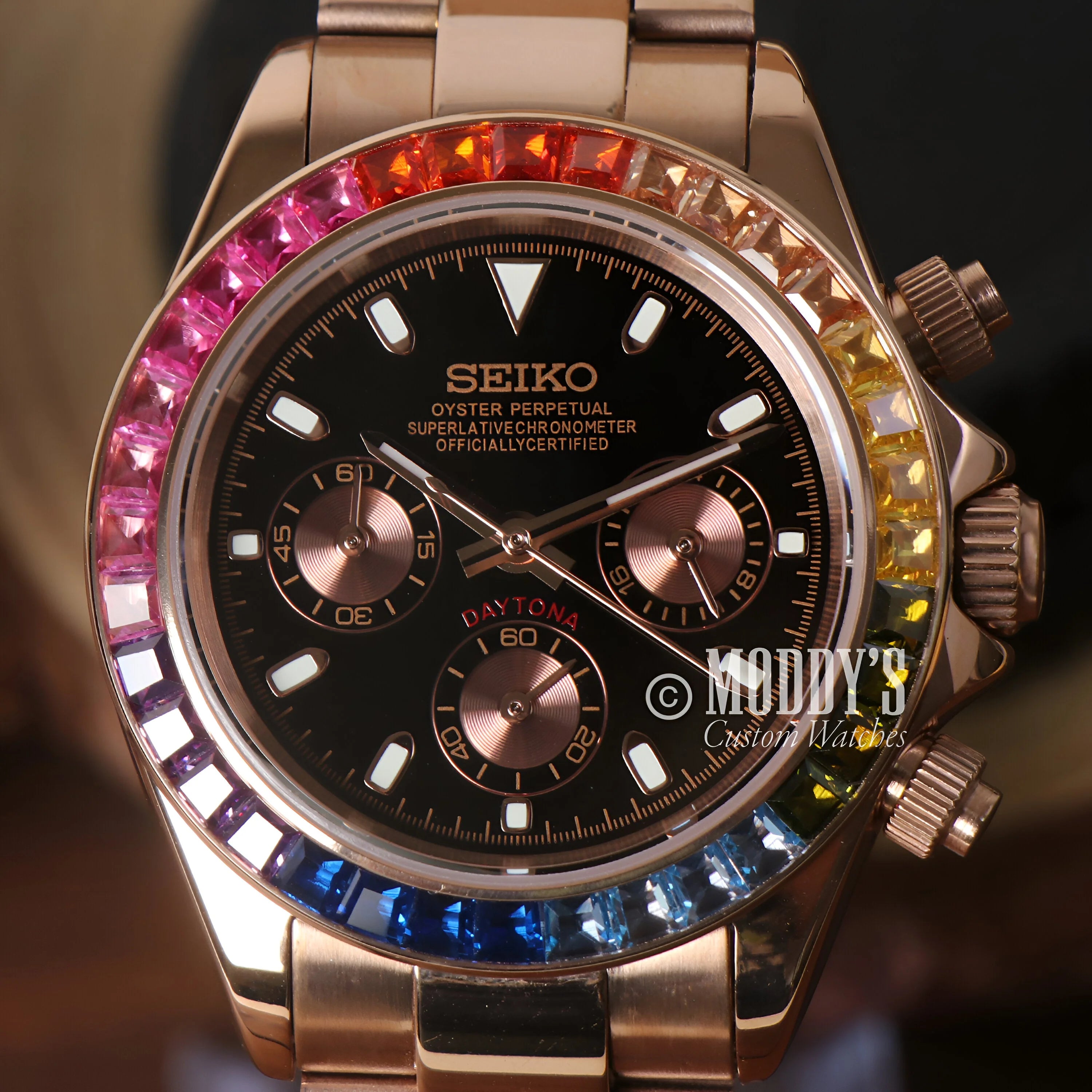 Seitona Rose Gold Rainbow Watch With Gemstone Bezel And Black Dial In a Sleek Case