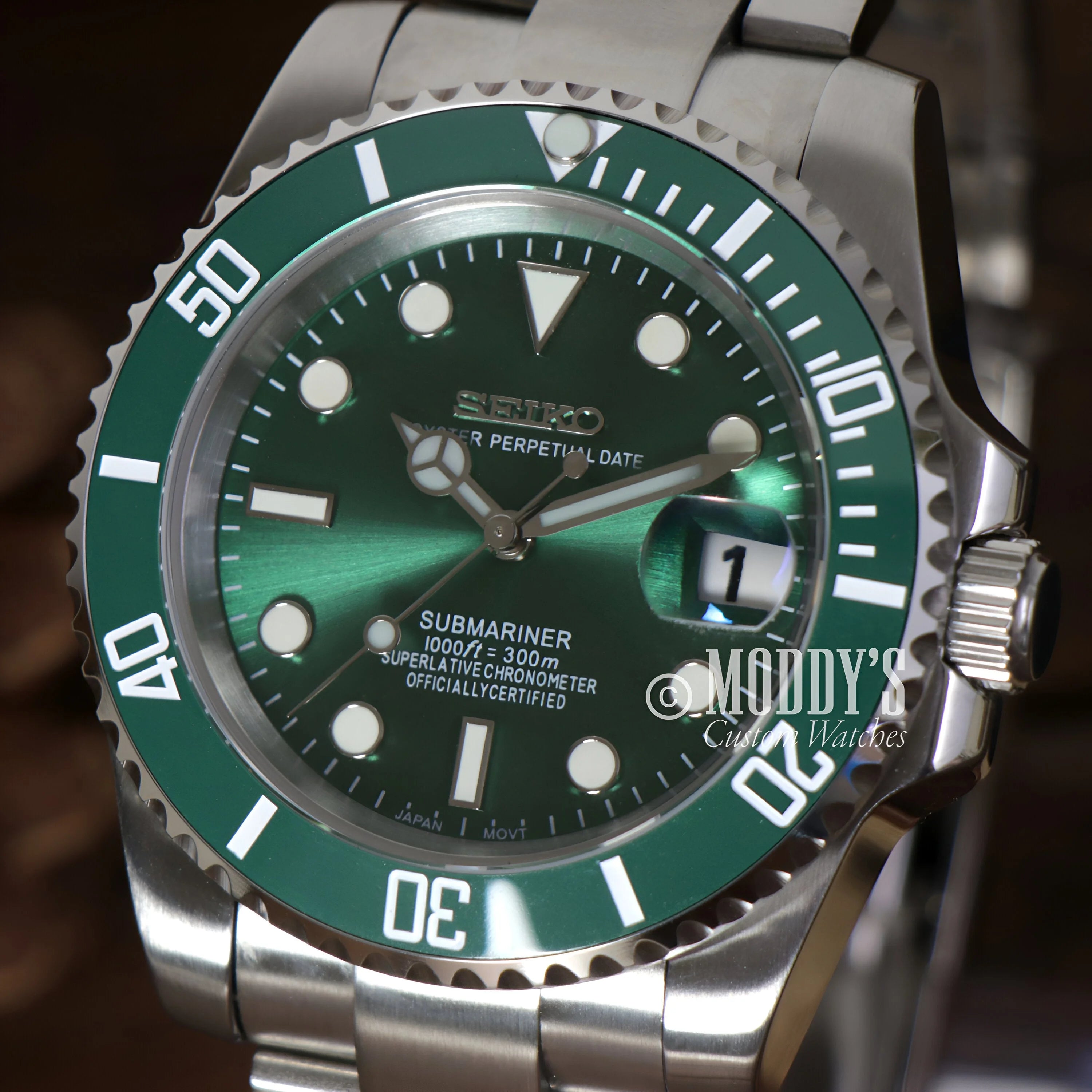 Rolex Submariner watch with green dial and bezel showcased in Seikomariner Hulk case