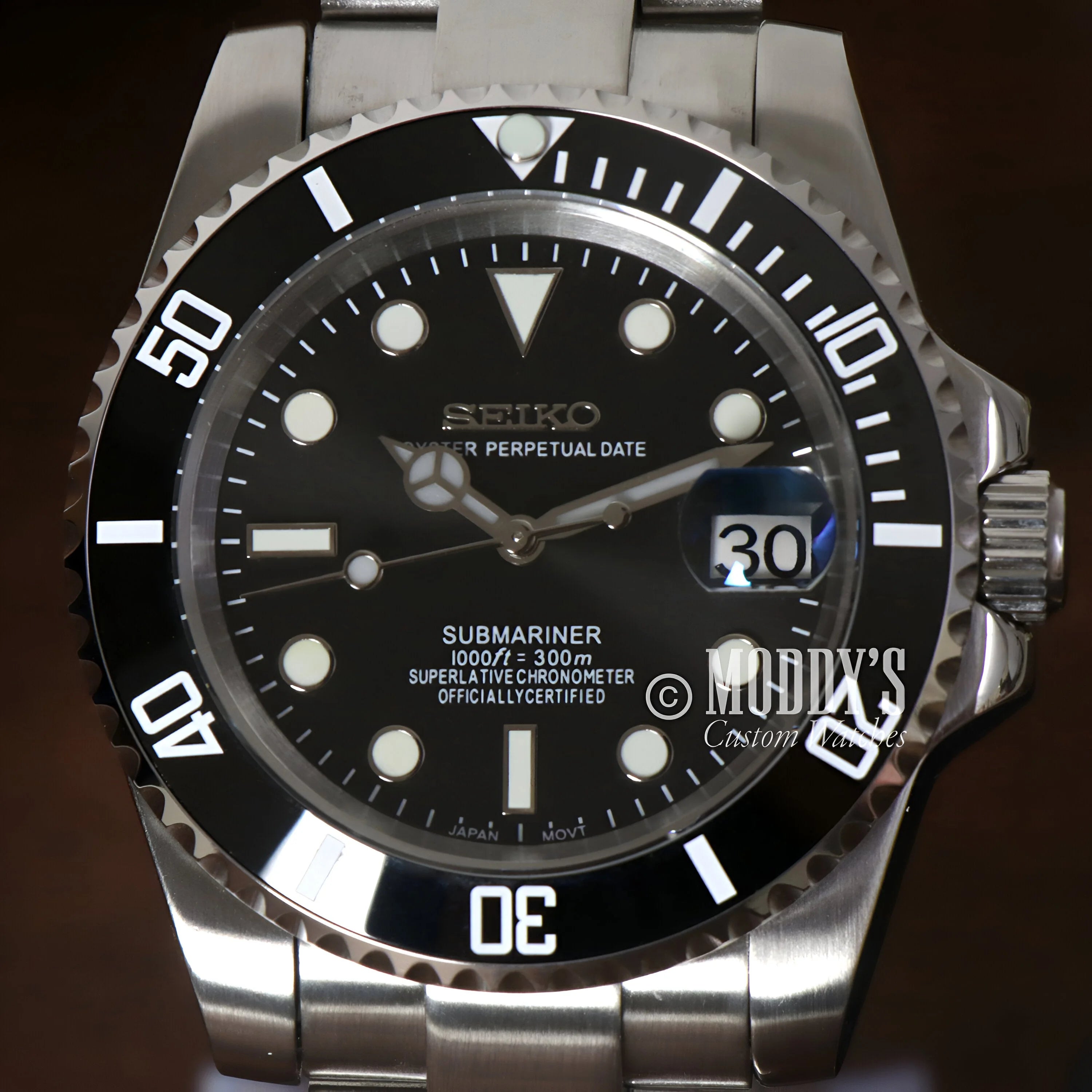 Seikomariner Black watch featuring a Rolex Submariner case with black dial and bezel