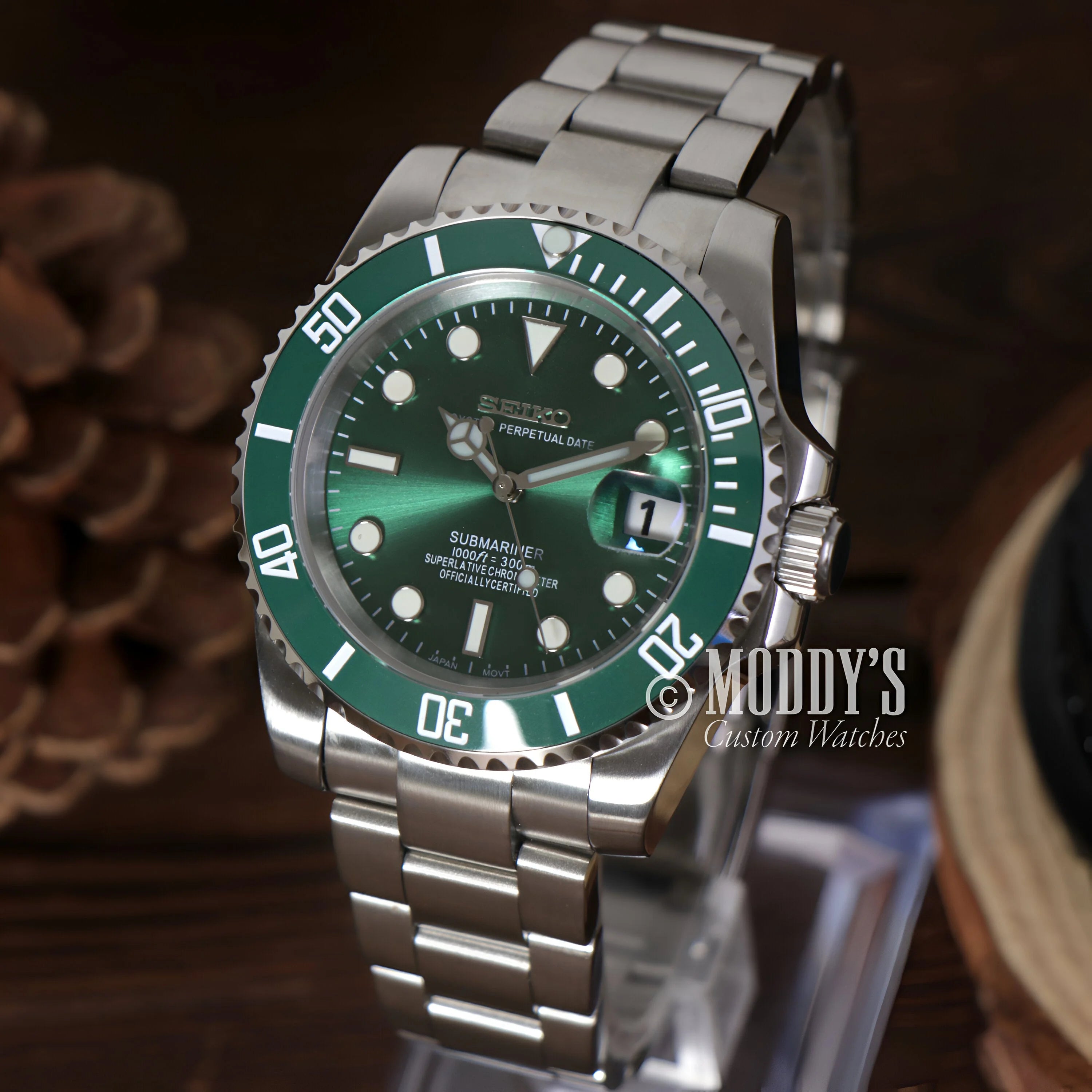 Stainless Steel Rolex Submariner watch with green dial and bezel in Seikomariner Hulk case